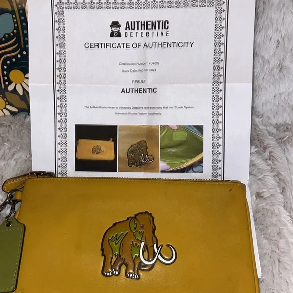 COACH RARE WOOLLY MAMMOTH WRISTLET EUC - Picture 15 of 15